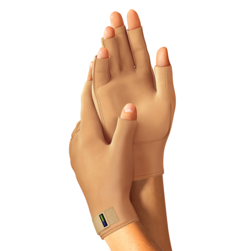 Hands wearing soft neoprene-free Actimove Arthritis gloves in beige 