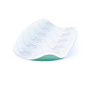 Cutimed Siltec Sorbact wound dressing with a white Siltec foam layer for absorption and a green Sorbact Technology layer for infection management.