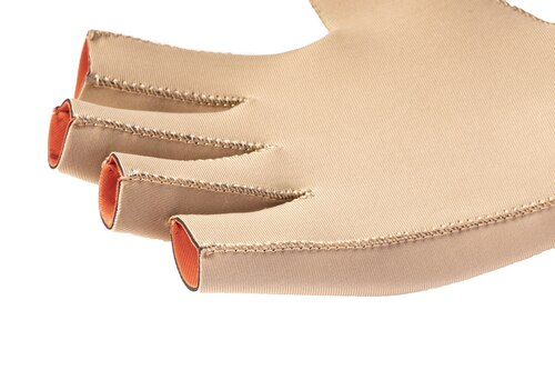 Close-up of Actimove Arthritis Gloves showing soft, neoprene-free fabric 
