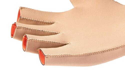 Close-up of Actimove Arthritis Gloves showing soft, neoprene-free fabric 
