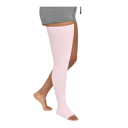 Close-up side view from thigh to toe of a person wearing rose-colored JOBST Relax open toe thigh-high compression socks.