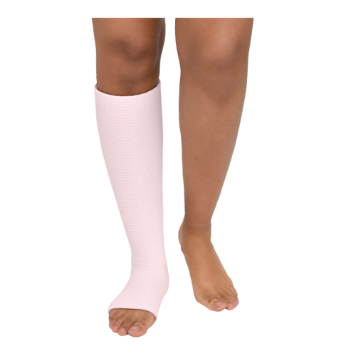 Person wearing a rose knee-high JOBST Relax compression garment. 