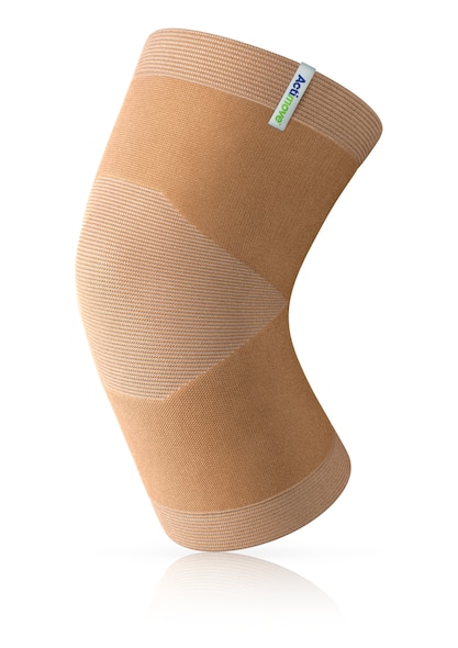 Beige knitted Actimove Arthritis Care Knee Support with heat reflecting technology
