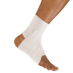 An individual with their ankle taped with Lightplast pro elastic adhesive bandage 
