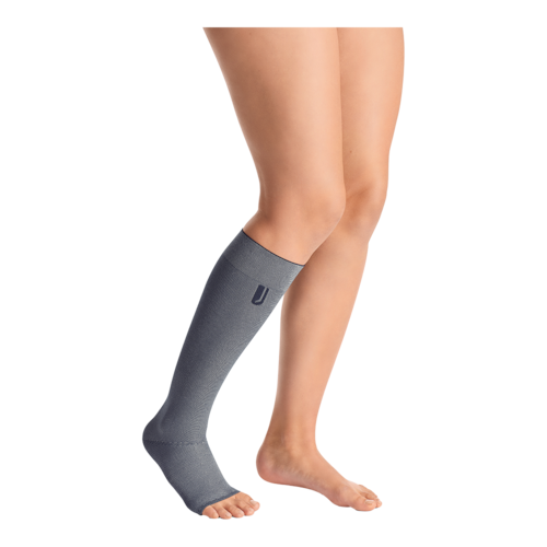 Person wearing a grey JOBST Confidence compression garment. 