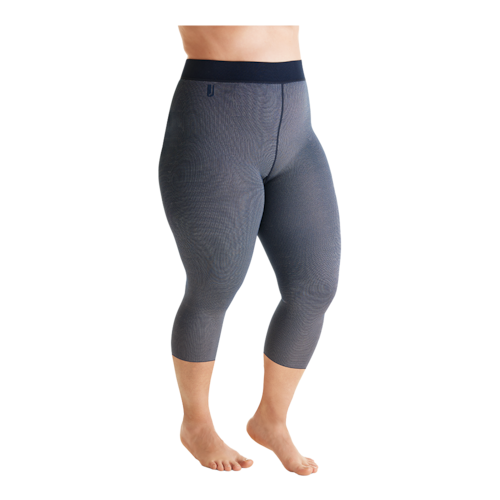 Person wearing a JOBST confidence grey capri length compression garment. 