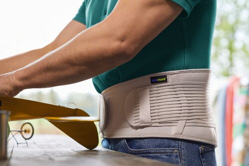 Close-up of the Actimove Everyday Supports Back Support with High Density Panel on man
