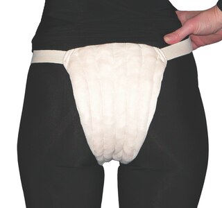 Diagram showing a female wearing JOBST Jovipad Genital Pad.