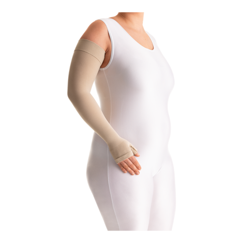 Female in a white bodysuit wearing a JOBST Bella Lite beige arm compression sleeve.