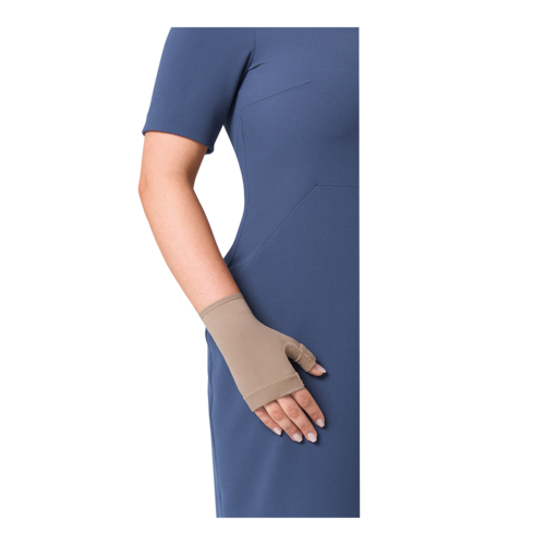 Female in a blue dress wearing JOBST Bella strong gauntlet glove.