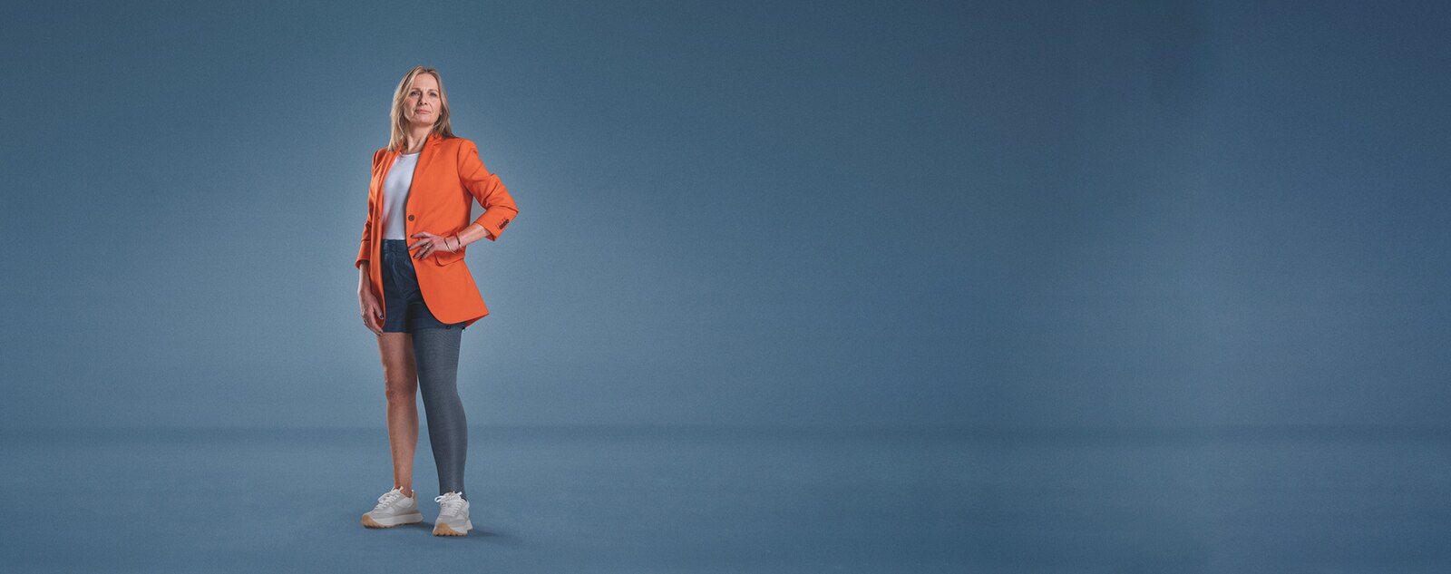 Woman standing naturally, with an assured expression, wearing JOBST Confidence