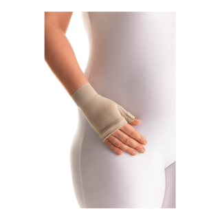 Female wearing a JOBST Bella Lite arm compression sleeve.