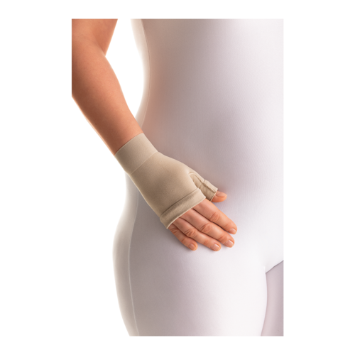 Female wearing a JOBST Bella Lite arm compression sleeve.