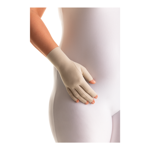 Female in a white bodysuit with her hands on her hips, showcasing JOBST Bella Lite Glove.