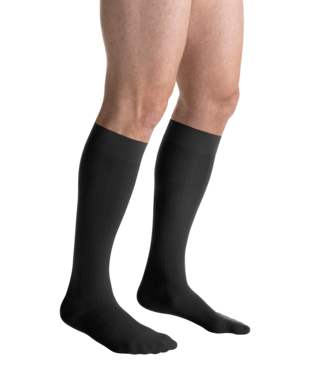 
Close-up side view of a person
wearing JOBST for men ambition Knee High Closed Toe Dark Grey