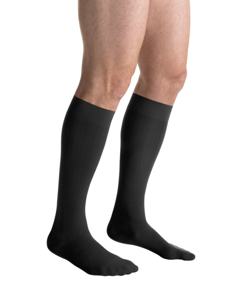 
Close-up side view of a person
wearing JOBST for men ambition Knee High Closed Toe Dark Grey